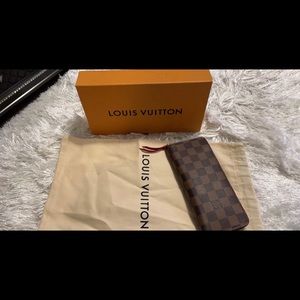 Leather Louis Vuitton wallet I carried it about 3 times